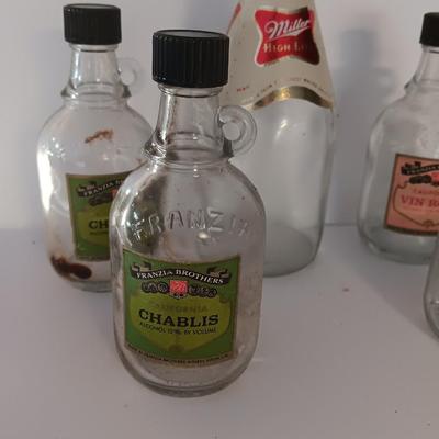 Glass Shot bottles and glass Miller High Life bottles with lables