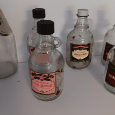 Glass Shot bottles and glass Miller High Life bottles with lables