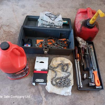Plastic toolbox full of Chainsaw tools with Jug of bar and saw chain lubricant and a gas can