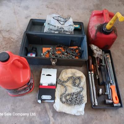 Plastic toolbox full of Chainsaw tools with Jug of bar and saw chain lubricant and a gas can