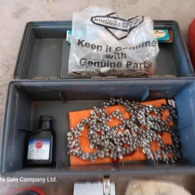 Plastic toolbox full of Chainsaw tools with Jug of bar and saw chain lubricant and a gas can