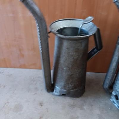 Two Vintage swivel spout oil cans - gallon Tool king & half gallon Huffman