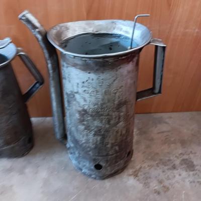 Two Vintage swivel spout oil cans - gallon Tool king & half gallon Huffman