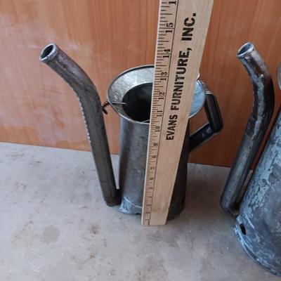 Two Vintage swivel spout oil cans - gallon Tool king & half gallon Huffman