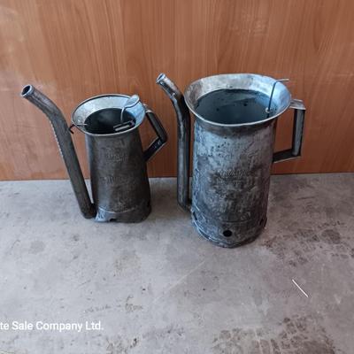 Two Vintage swivel spout oil cans - gallon Tool king & half gallon Huffman