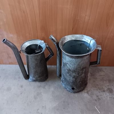 Two Vintage swivel spout oil cans - gallon Tool king & half gallon Huffman