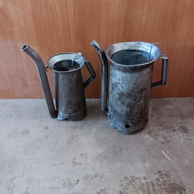 Two Vintage swivel spout oil cans - gallon Tool king & half gallon Huffman