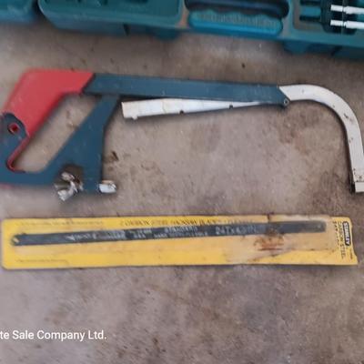 Two incomplete tool kits in organizing boxes -