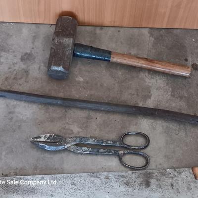 Sledgehammer - crowbar - large sheers- and a hand saw