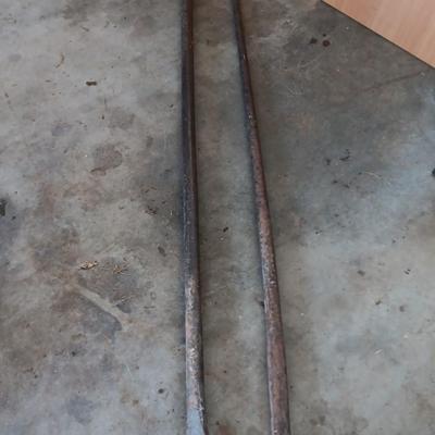 Two steel prybars