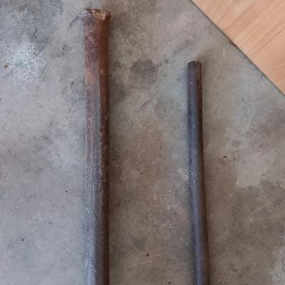 Two steel prybars