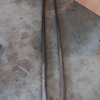 Two steel prybars