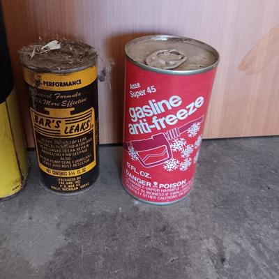 Older collectible cans and metal containers of chemicals