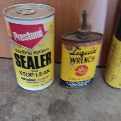 Older collectible cans and metal containers of chemicals