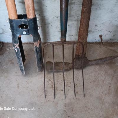 Post hole digger - pick ax - and nice pitchfork AKA WORK.