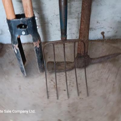 Post hole digger - pick ax - and nice pitchfork AKA WORK.
