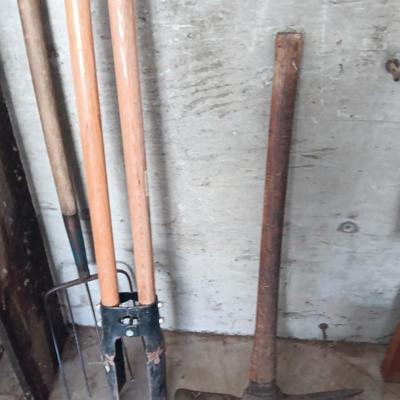 Post hole digger - pick ax - and nice pitchfork AKA WORK.