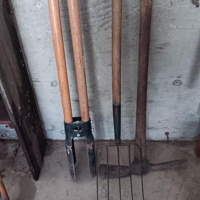 Post hole digger - pick ax - and nice pitchfork AKA WORK.