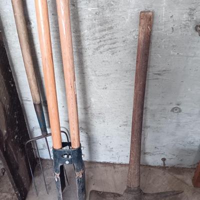 Post hole digger - pick ax - and nice pitchfork AKA WORK.
