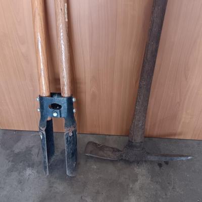 Post hole digger - pick ax - and nice pitchfork AKA WORK.