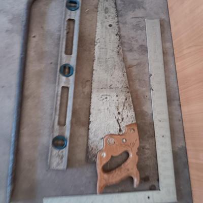 Hand saw - Level - pry bar and a Square