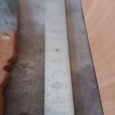 Hand saw - Level - pry bar and a Square
