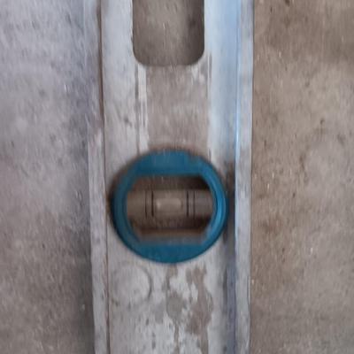 Hand saw - Level - pry bar and a Square