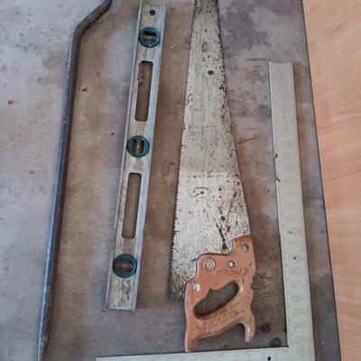 Hand saw - Level - pry bar and a Square