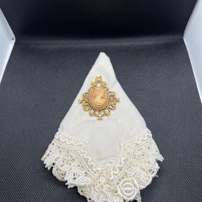 Vintage cameo on lace hanky