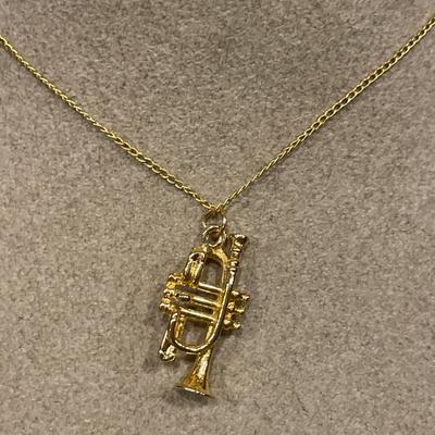Small trumpet charm necklace