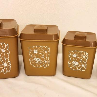 Lot #106 Set of 4 Nesting Mid Century Modern Kitchen Canisters