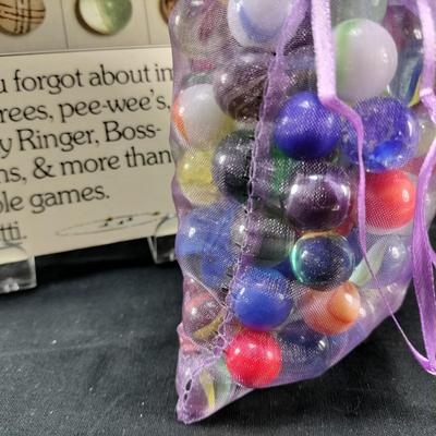 Bag and Book of Marbles