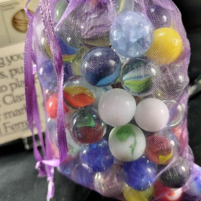 Bag and Book of Marbles