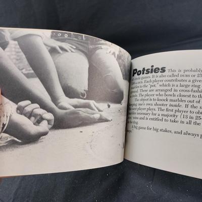 Bag and Book of Marbles