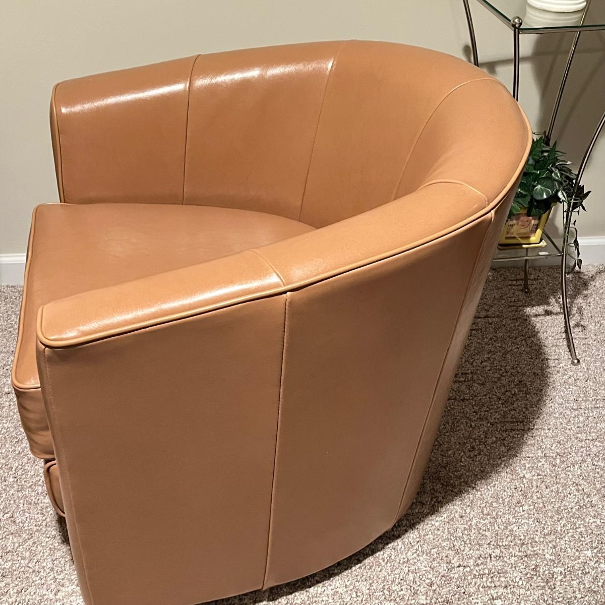 LOT 73B: Two Faux Leather Swivel Club Chairs with Accent Table