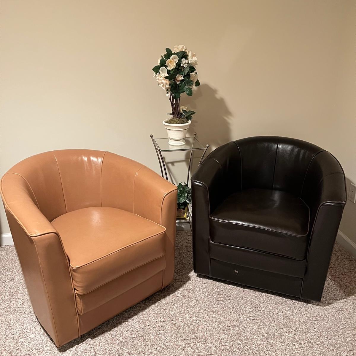 LOT 73B: Two Faux Leather Swivel Club Chairs with Accent Table