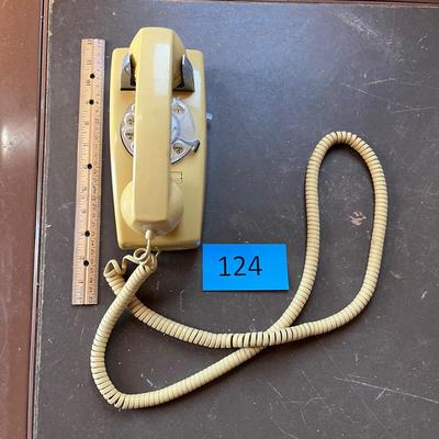 Vintage yellow wall phone