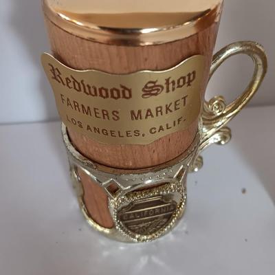 Vintage Salt & Pepper shakers from California - wooden with gold-colored holders and Oranges