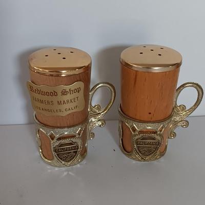 Vintage Salt & Pepper shakers from California - wooden with gold-colored holders and Oranges
