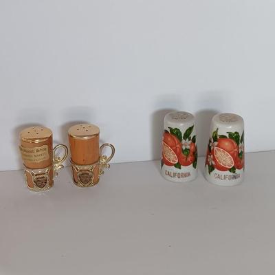 Vintage Salt & Pepper shakers from California - wooden with gold-colored holders and Oranges