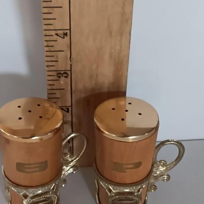 Vintage Salt & Pepper shakers from California - wooden with gold-colored holders and Oranges