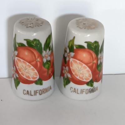 Vintage Salt & Pepper shakers from California - wooden with gold-colored holders and Oranges