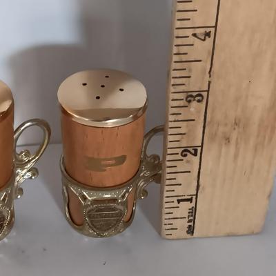 Vintage Salt & Pepper shakers from California - wooden with gold-colored holders and Oranges