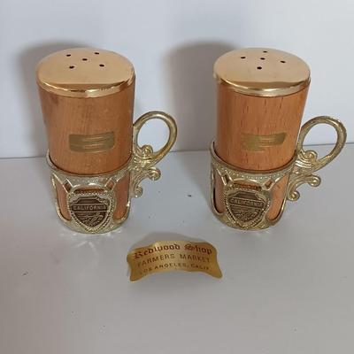 Vintage Salt & Pepper shakers from California - wooden with gold-colored holders and Oranges