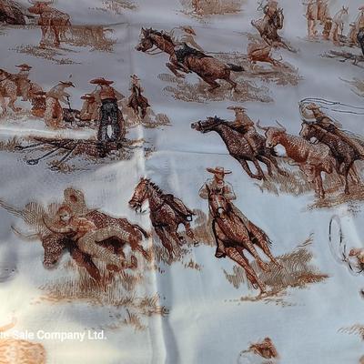Vintage wooden covered wagon with horse team and wild west cowboy fabric