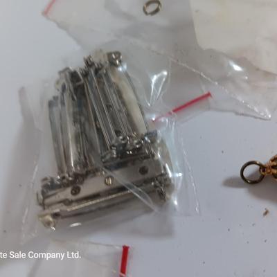 Assortment of Jewelry making supplies - ear rings - necklaces - pendent mounts