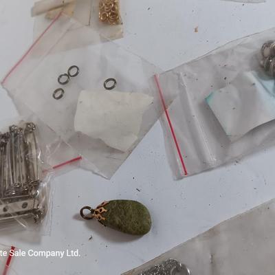 Assortment of Jewelry making supplies - ear rings - necklaces - pendent mounts