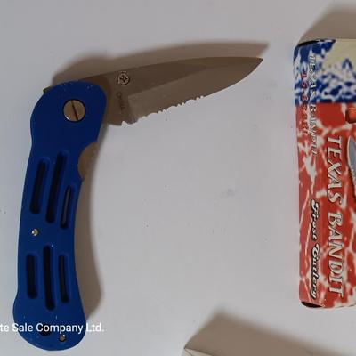 Two brand new pocketknives - green Beret folder and Texas Bandit