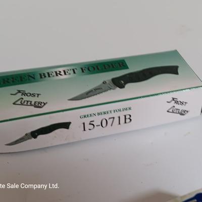 Two brand new pocketknives - green Beret folder and Texas Bandit