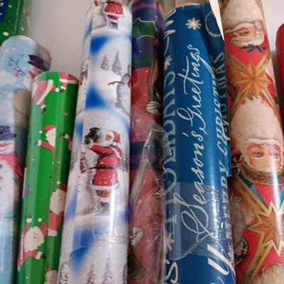 Several rolls of Christmas wrapping paper